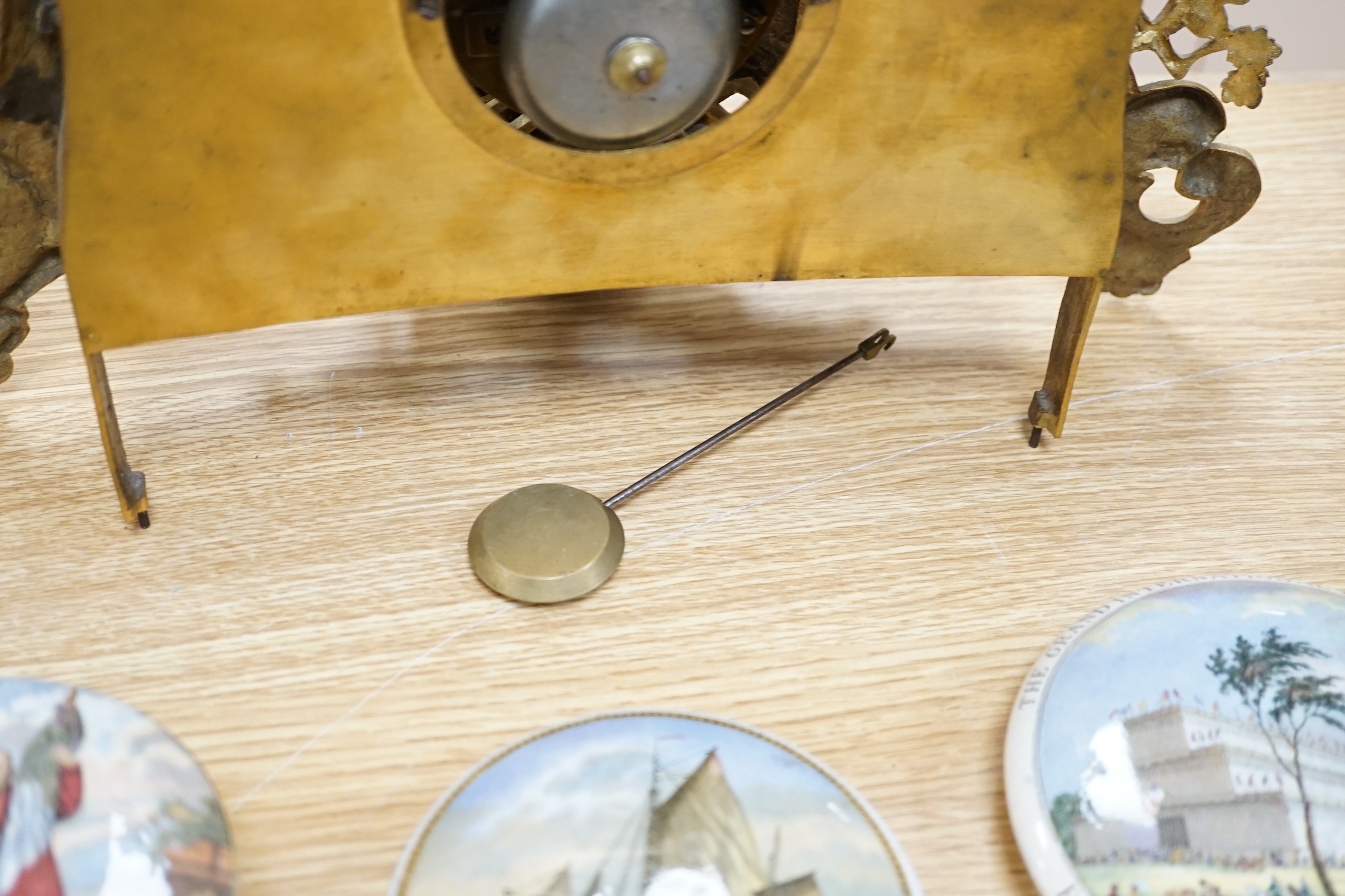 A Louis XV style gilt metal cased eight day mantel clock, 37cm tall